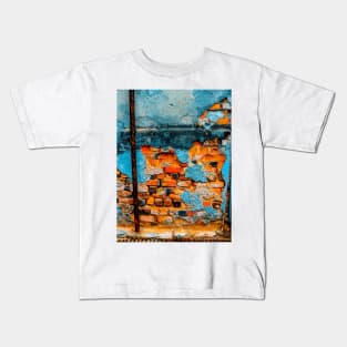 Orange blue brick wall with lion profile Kids T-Shirt